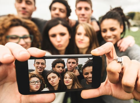 Image showing a group of millennials taking a selfie